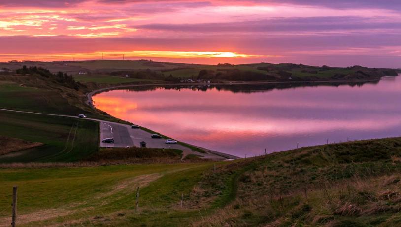 Toppen af Hanklit-solnedgang