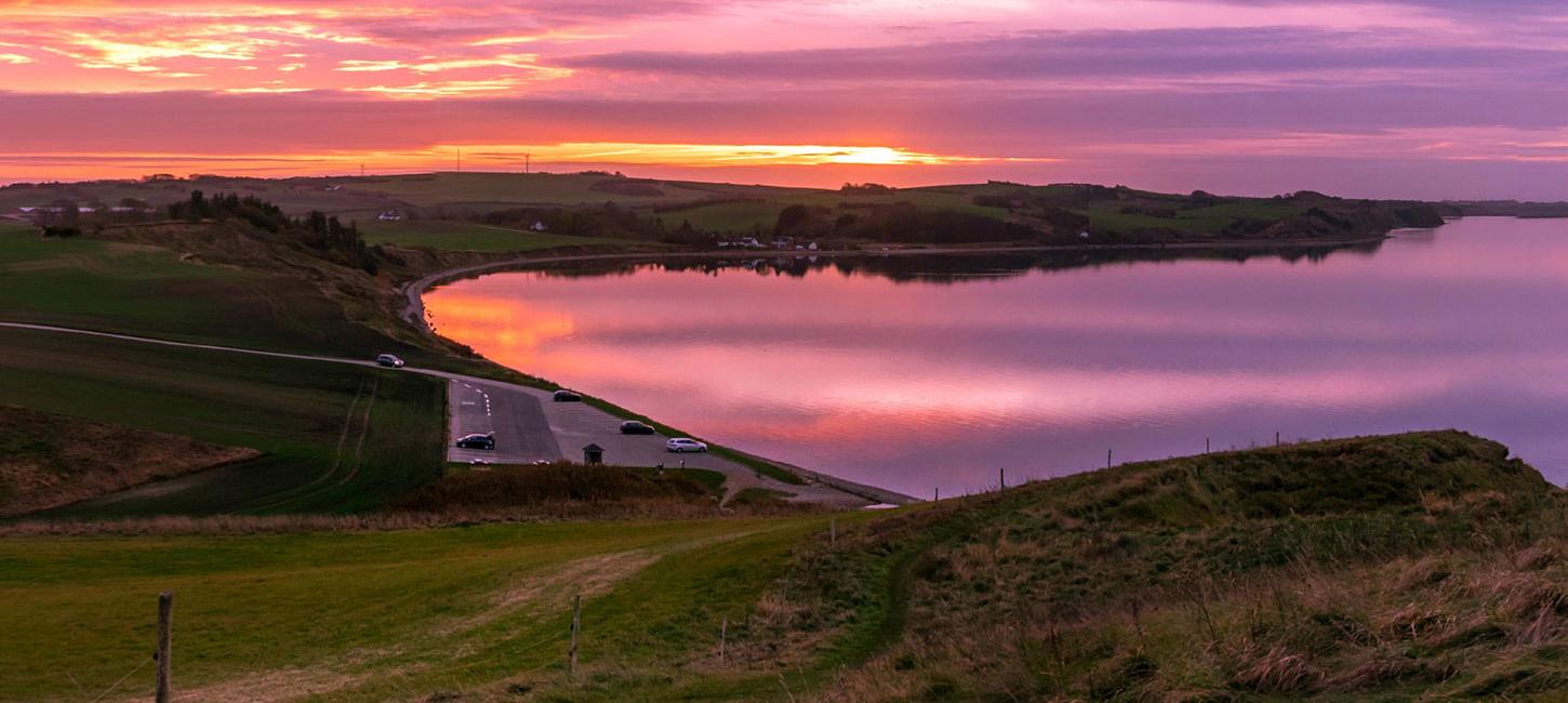 Toppen af Hanklit-solnedgang