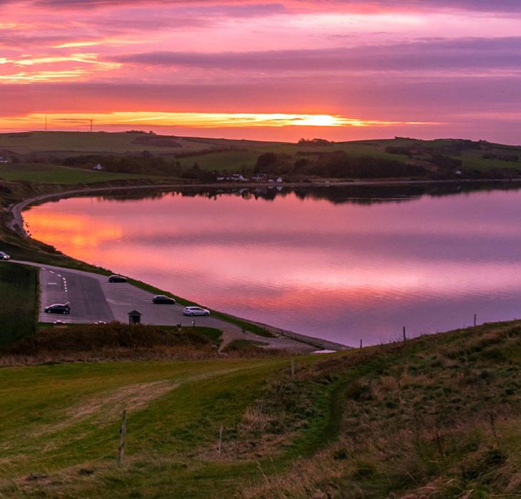 Toppen af Hanklit-solnedgang